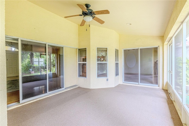 3798 N Chandler Dr, Hernando, FL 34442 - unfurnished sunroom with a ceiling fan, vaulted ceiling, healthy amount of natural light, and carpet