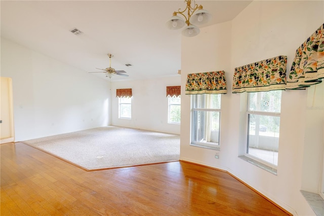 3798 N Chandler Dr, Hernando, FL 34442 - spare room featuring wood finished floors, a chandelier, ceiling fan, and baseboards
