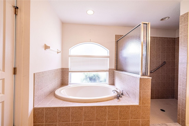 3798 N Chandler Dr, Hernando, FL 34442 - bathroom with a garden tub, tiled shower, and recessed lighting