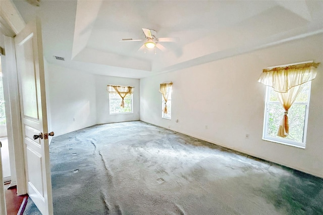 3798 N Chandler Dr, Hernando, FL 34442 - empty room featuring a raised ceiling, carpet floors, and ceiling fan