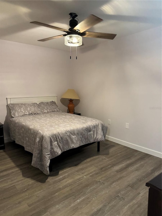 135 Wild Palm Dr, Bradenton, FL 34210 - bedroom featuring wood finished floors, baseboards, and a ceiling fan