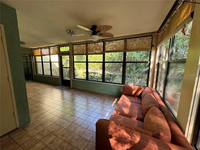 135 Wild Palm Dr, Bradenton, FL 34210 - sunroom / solarium featuring a textured ceiling and tile patterned floors