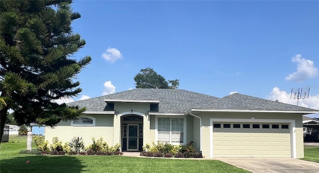 200 S Goodman Ave, Lake Alfred, FL 33850 - ranch-style house featuring stucco siding, an attached garage, a front yard, and concrete driveway