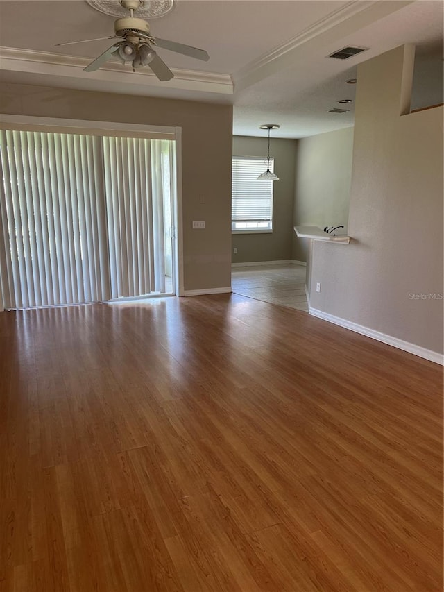 200 S Goodman Ave, Lake Alfred, FL 33850 - unfurnished room with ceiling fan, baseboards, and wood finished floors