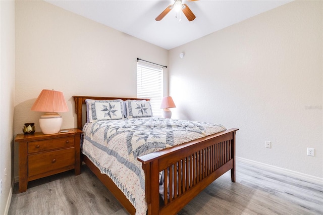 3281 Enclave Blvd, Mulberry, FL 33860 - bedroom with wood finished floors, baseboards, and a ceiling fan