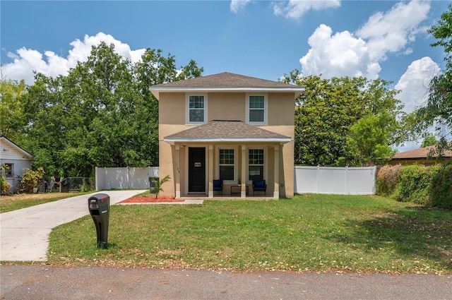 1105 Watersedge Dr, Lakeland, FL 33801 - view of front facade with stucco siding, driveway, covered porch, and roof with shingles