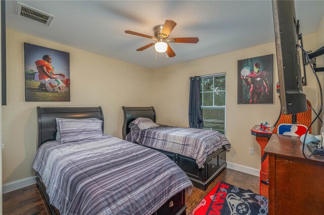 1105 Watersedge Dr, Lakeland, FL 33801 - bedroom featuring baseboards, wood finished floors, and ceiling fan