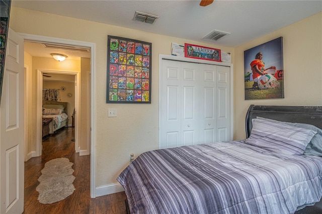 1105 Watersedge Dr, Lakeland, FL 33801 - bedroom with wood finished floors, baseboards, and a closet