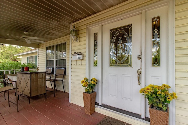330 W Palmetto St, Lakeland, FL 33815 - entrance to property with covered porch, a ceiling fan, and outdoor dining area