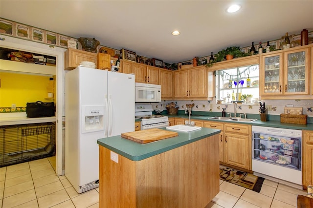 330 W Palmetto St, Lakeland, FL 33815 - kitchen with white appliances, a sink, light tile patterned floors, dark countertops, and recessed lighting