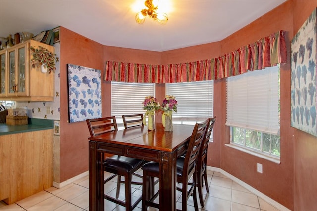 330 W Palmetto St, Lakeland, FL 33815 - dining space featuring light tile patterned flooring and baseboards