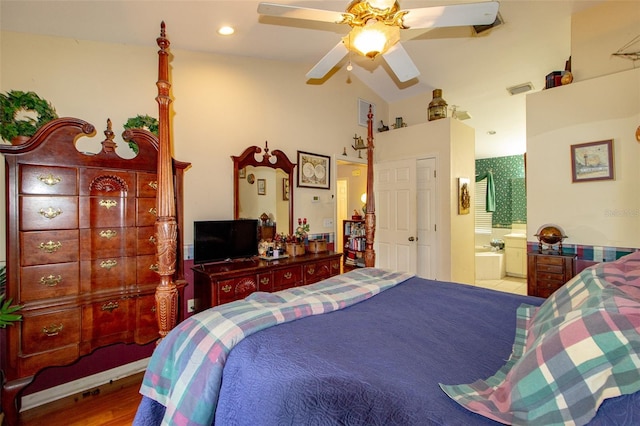 330 W Palmetto St, Lakeland, FL 33815 - bedroom featuring lofted ceiling, wood finished floors, a ceiling fan, and ensuite bath