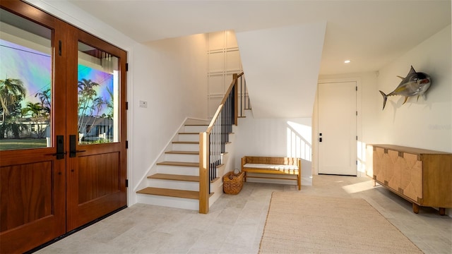 531 68th St, Holmes Beach, FL 34217 - foyer entrance with stairs, recessed lighting, and light tile patterned floors