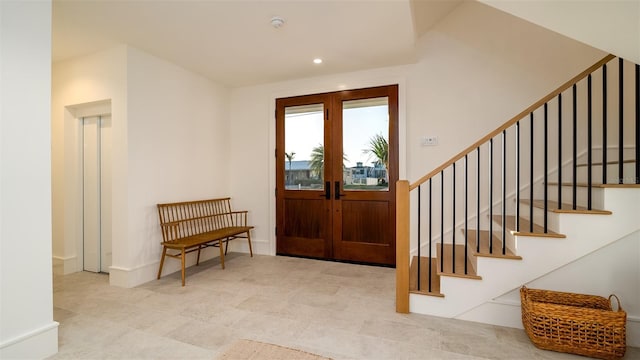 531 68th St, Holmes Beach, FL 34217 - foyer featuring stairs, french doors, and recessed lighting