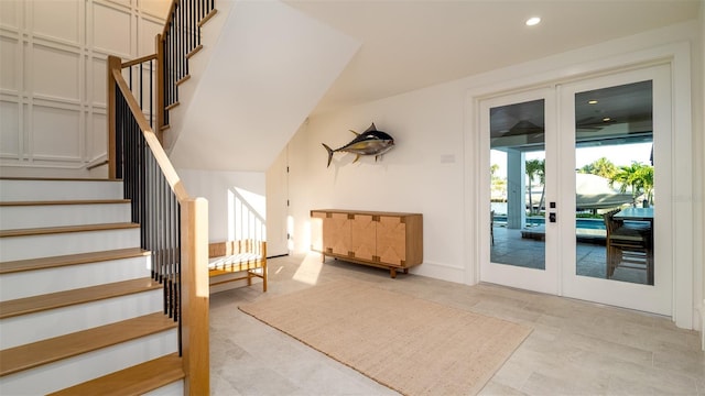 531 68th St, Holmes Beach, FL 34217 - doorway to outside featuring stairway, recessed lighting, and french doors