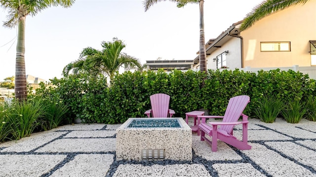 531 68th St, Holmes Beach, FL 34217 - view of patio / terrace featuring an outdoor fire pit
