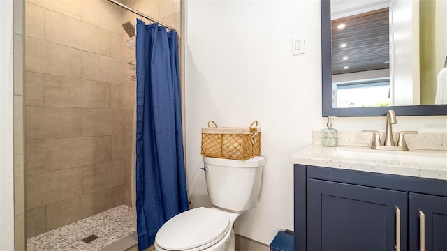 531 68th St, Holmes Beach, FL 34217 - bathroom with toilet, a tile shower, and vanity