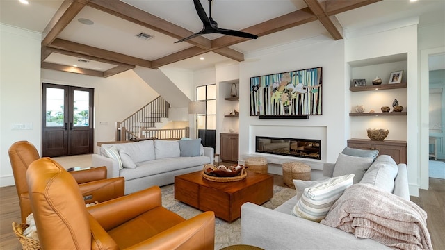 531 68th St, Holmes Beach, FL 34217 - living room with coffered ceiling, wood finished floors, stairs, beam ceiling, and a ceiling fan