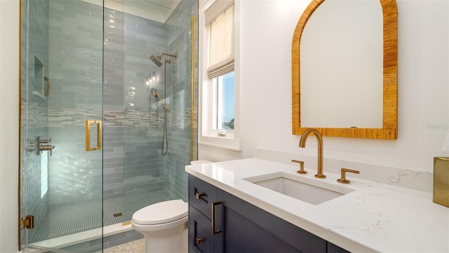 531 68th St, Holmes Beach, FL 34217 - bathroom with a shower stall, vanity, and toilet