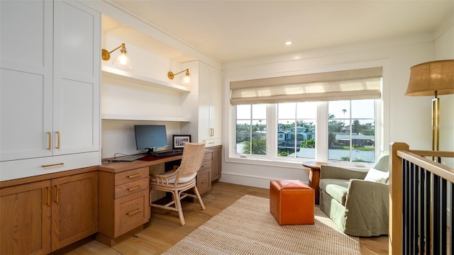 531 68th St, Holmes Beach, FL 34217 - home office with built in desk and light wood finished floors