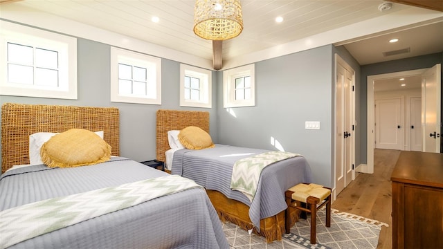 531 68th St, Holmes Beach, FL 34217 - bedroom featuring wood finished floors and recessed lighting