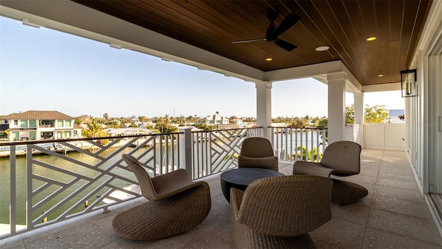 531 68th St, Holmes Beach, FL 34217 - balcony featuring a ceiling fan, a water view, and a residential view