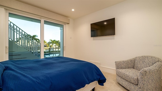 531 68th St, Holmes Beach, FL 34217 - bedroom featuring recessed lighting, access to exterior, and baseboards
