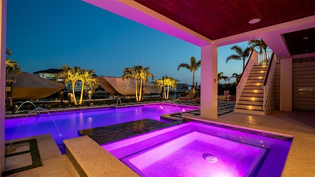 531 68th St, Holmes Beach, FL 34217 - swimming pool featuring an in-ground hot tub, stairs, and a patio area