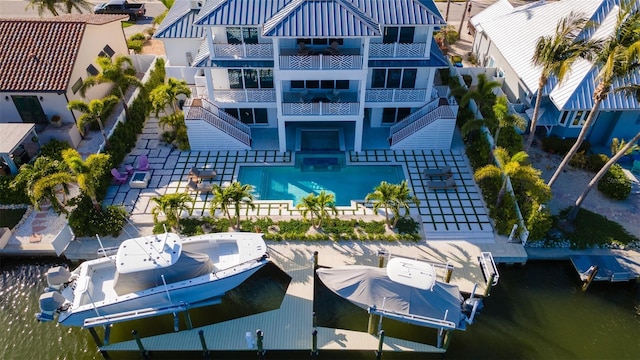 531 68th St, Holmes Beach, FL 34217 - view of subject property with a large body of water and a pool