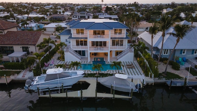 531 68th St, Holmes Beach, FL 34217 - aerial view of residential area with a nearby body of water and a pool