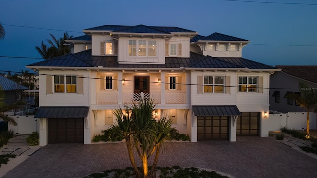 531 68th St, Holmes Beach, FL 34217 - modern farmhouse style home featuring a standing seam roof, a garage, and metal roof