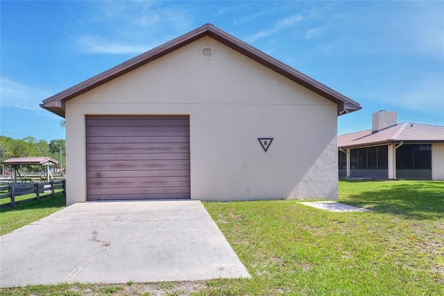 4404 Musket Dr, Lakeland, FL 33810 - detached garage featuring concrete driveway