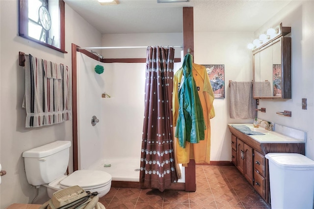 4404 Musket Dr, Lakeland, FL 33810 - bathroom featuring toilet, a stall shower, and vanity