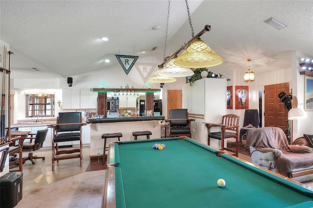 4404 Musket Dr, Lakeland, FL 33810 - rec room featuring a textured ceiling, pool table, and lofted ceiling