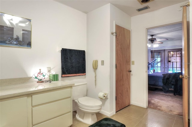4404 Musket Dr, Lakeland, FL 33810 - bathroom with ensuite bath, toilet, a ceiling fan, baseboards, and vanity