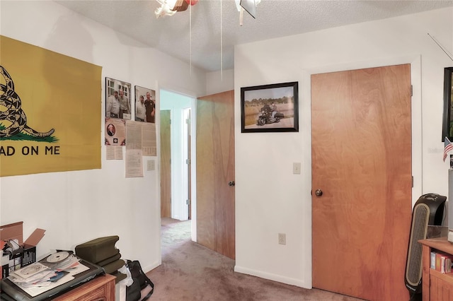 4404 Musket Dr, Lakeland, FL 33810 - home office with carpet flooring, baseboards, and a ceiling fan
