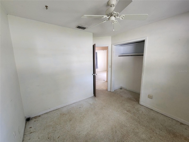 220 Pinehurst Dr, Auburndale, FL 33823 - unfurnished bedroom featuring a closet and a ceiling fan