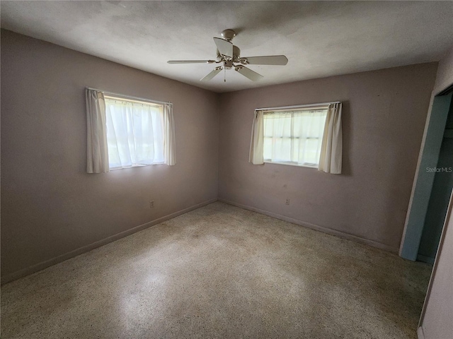 220 Pinehurst Dr, Auburndale, FL 33823 - unfurnished bedroom featuring baseboards and ceiling fan