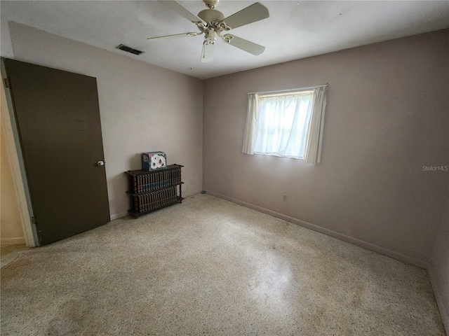 220 Pinehurst Dr, Auburndale, FL 33823 - unfurnished bedroom with ceiling fan and speckle patterned floor