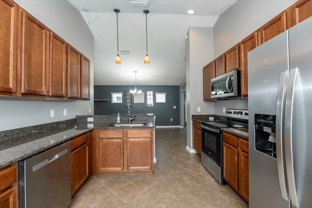 12654 Belcroft Dr, Riverview, FL 33579 - kitchen with stainless steel appliances, a sink, vaulted ceiling, brown cabinetry, and a chandelier