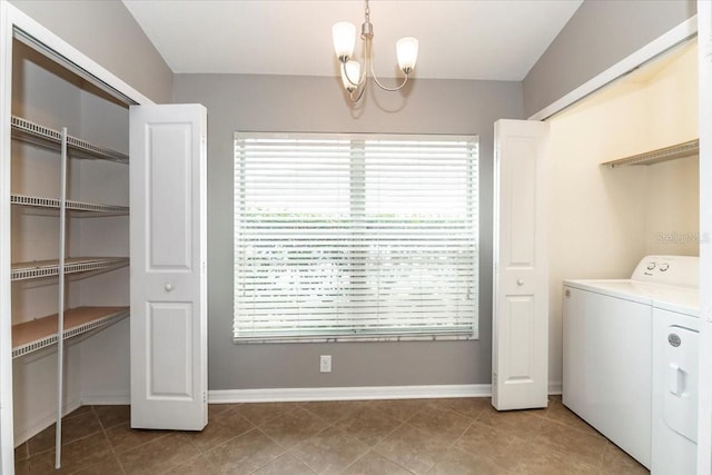 12654 Belcroft Dr, Riverview, FL 33579 - clothes washing area with plenty of natural light, a chandelier, washing machine and dryer, and tile patterned floors