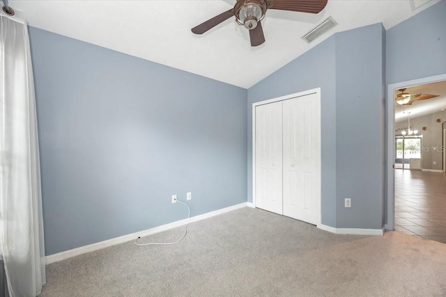 12654 Belcroft Dr, Riverview, FL 33579 - unfurnished bedroom with carpet floors, lofted ceiling, a closet, baseboards, and a ceiling fan