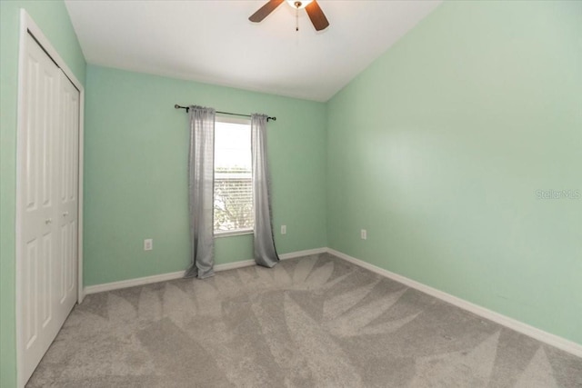 12654 Belcroft Dr, Riverview, FL 33579 - unfurnished bedroom featuring carpet, a closet, baseboards, and ceiling fan