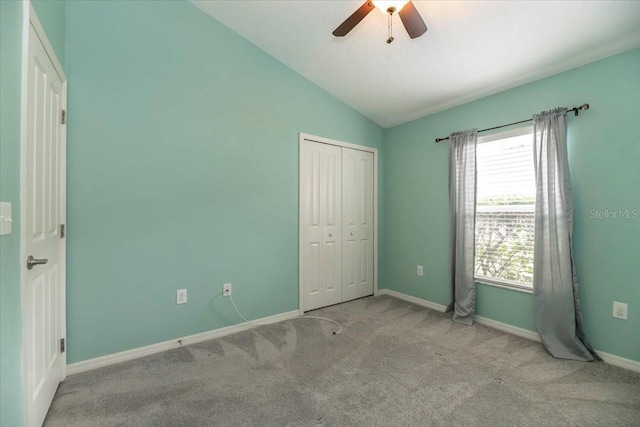 12654 Belcroft Dr, Riverview, FL 33579 - unfurnished bedroom featuring carpet, lofted ceiling, baseboards, a closet, and ceiling fan
