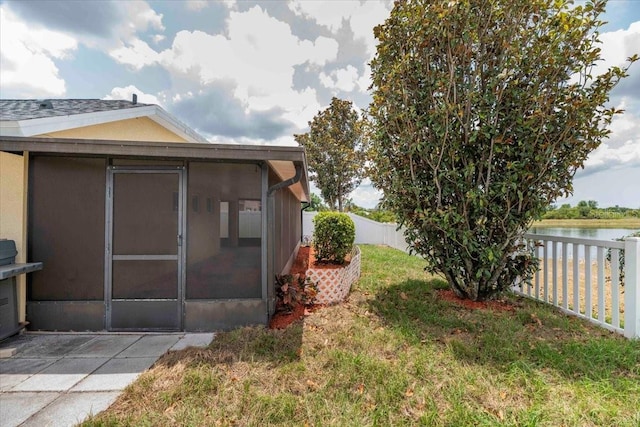 12654 Belcroft Dr, Riverview, FL 33579 - view of outdoor structure with a sunroom and a water view