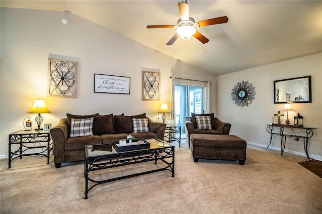carpeted living room featuring vaulted ceiling, a ceiling fan, and baseboards