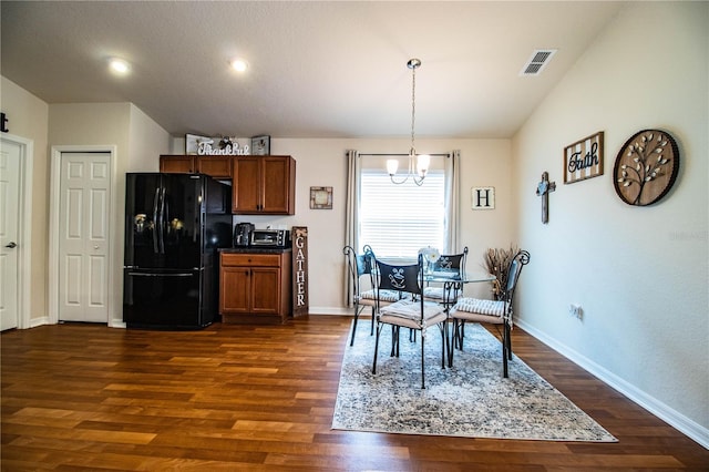 dining area with a chandelier, dark wood finished floors, baseboards, lofted ceiling, and recessed lighting