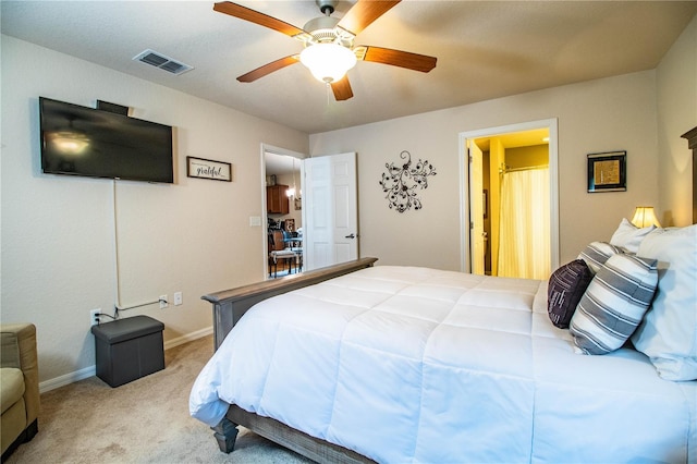 carpeted bedroom with baseboards and a ceiling fan