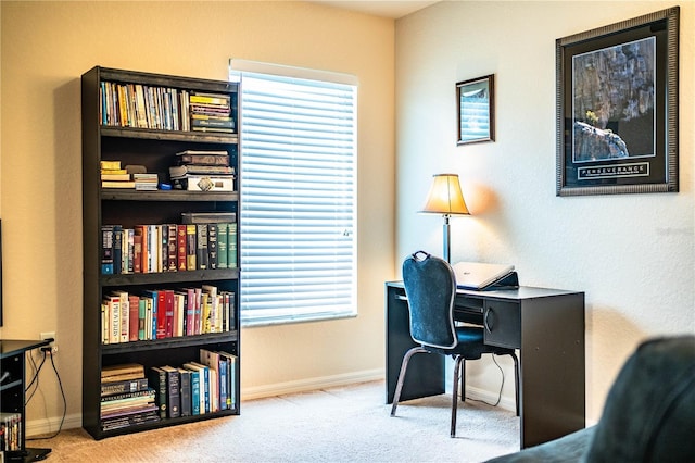 carpeted office with baseboards