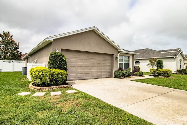 single story home featuring an attached garage, stucco siding, driveway, and cooling unit